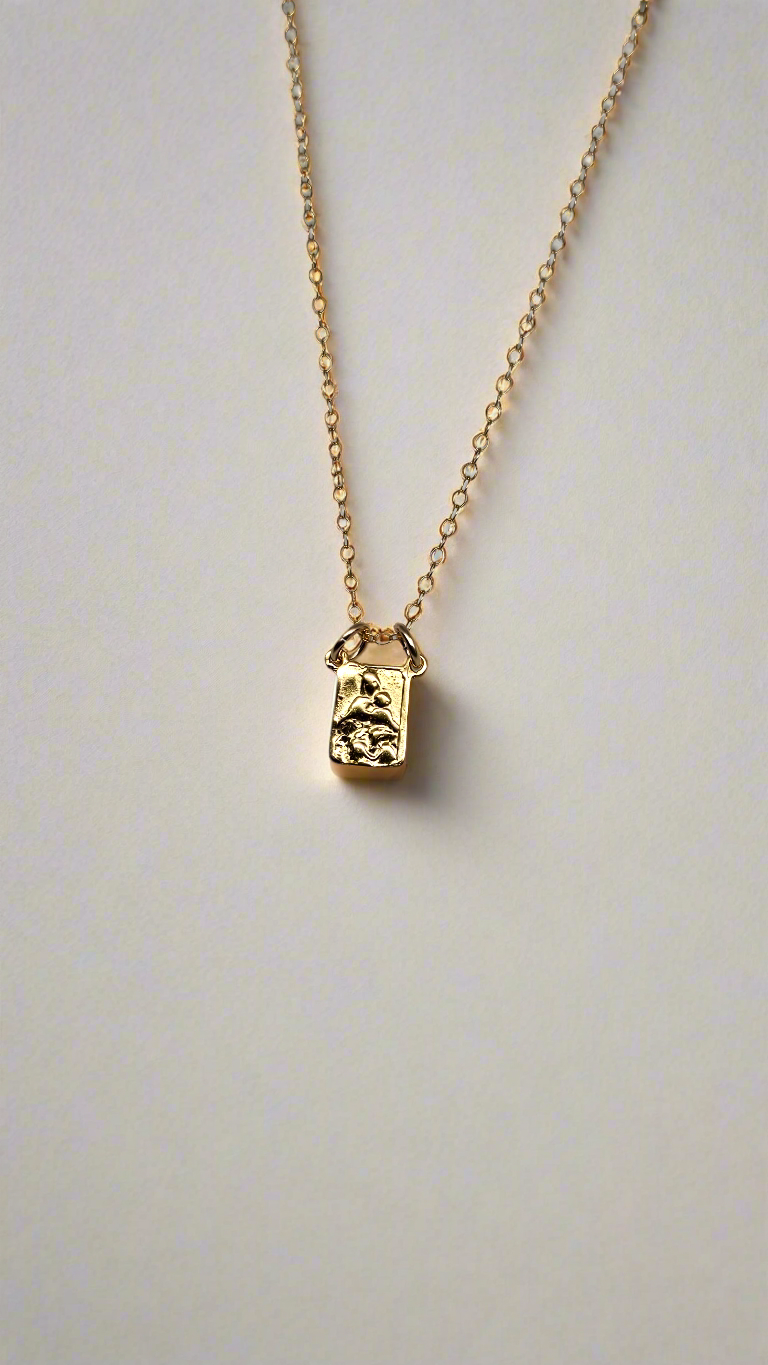 Gold vermeil scapular necklace with one rectangular pendant centered on the chain