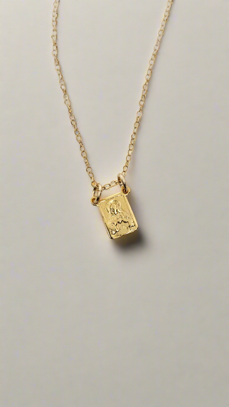 Gold vermeil scapular necklace with a single rectangular pendant on a gold chain
