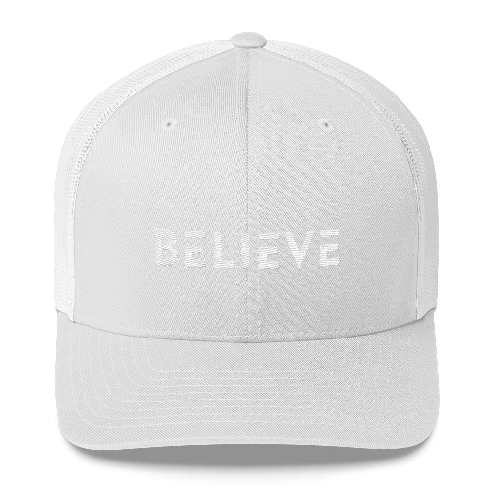 Snapback trucker hat with subtle 'BELIEVE' white embroidery on light cap
