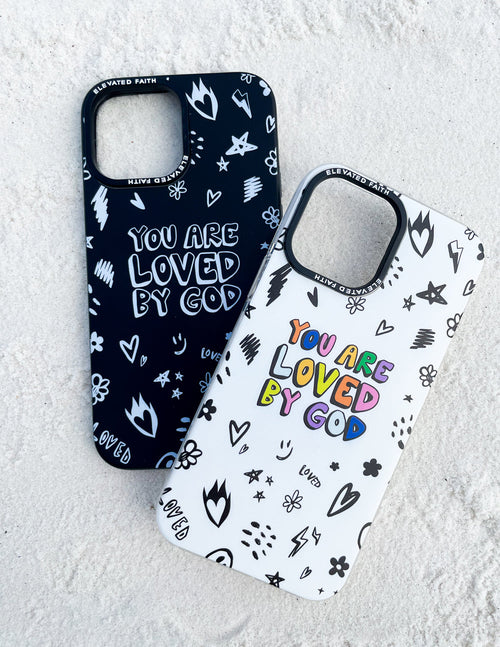 Two black phone cases with 'You are loved by God' lettering and white heart, star icons