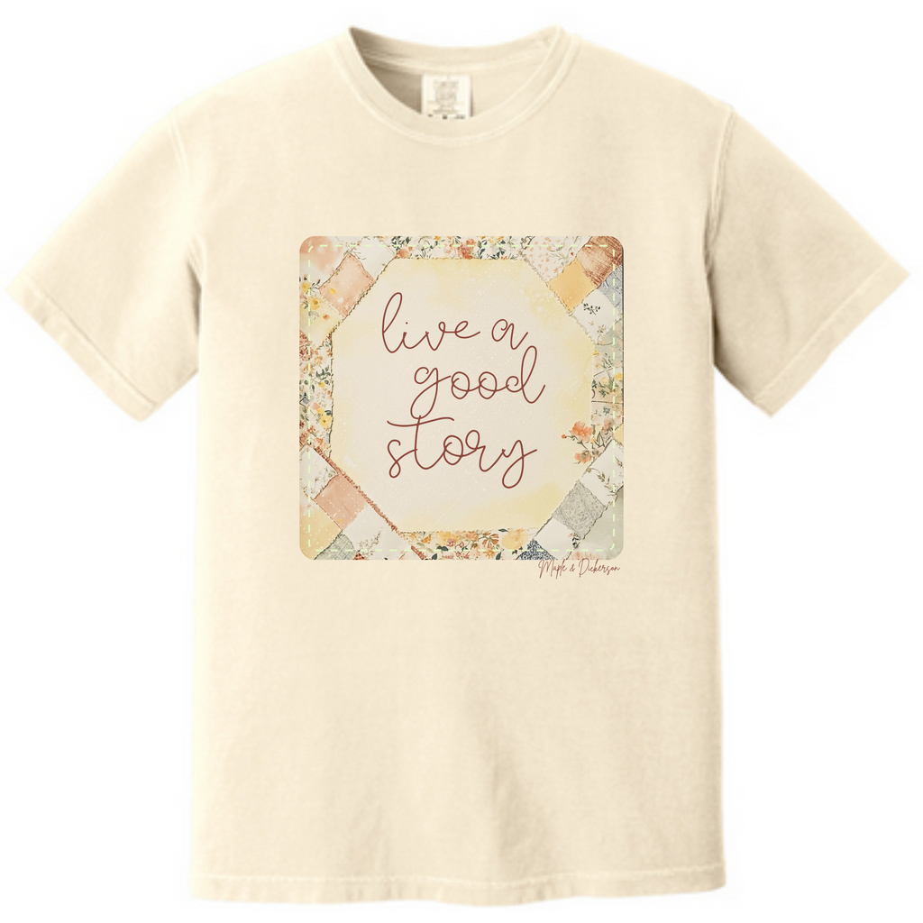Ivory crewneck T-shirt with front graphic: 'live a good story'