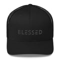 Black snapback trucker hat with embossed Blessed lettering on front