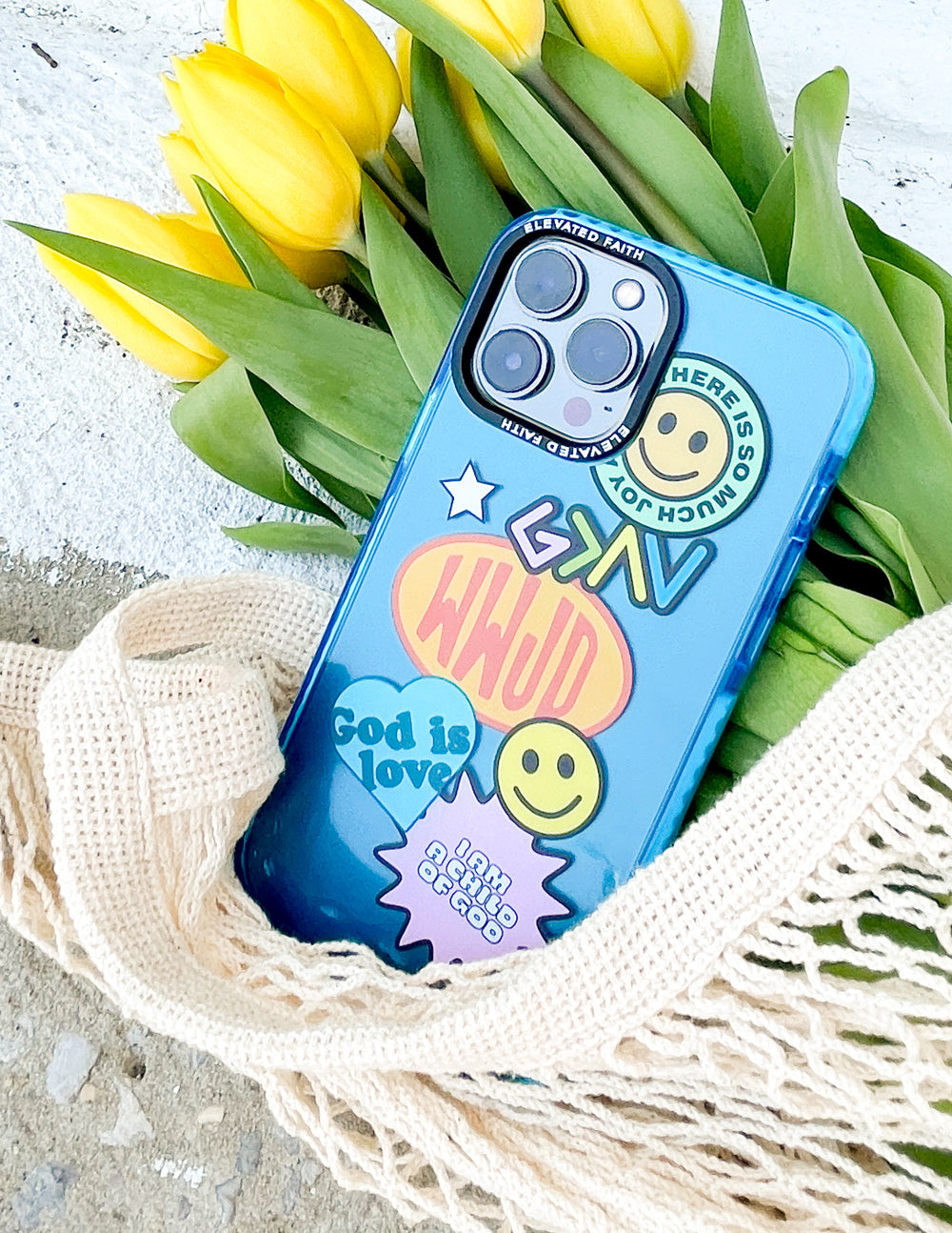 Blue sticker collage phone case with smiley face and starburst icons