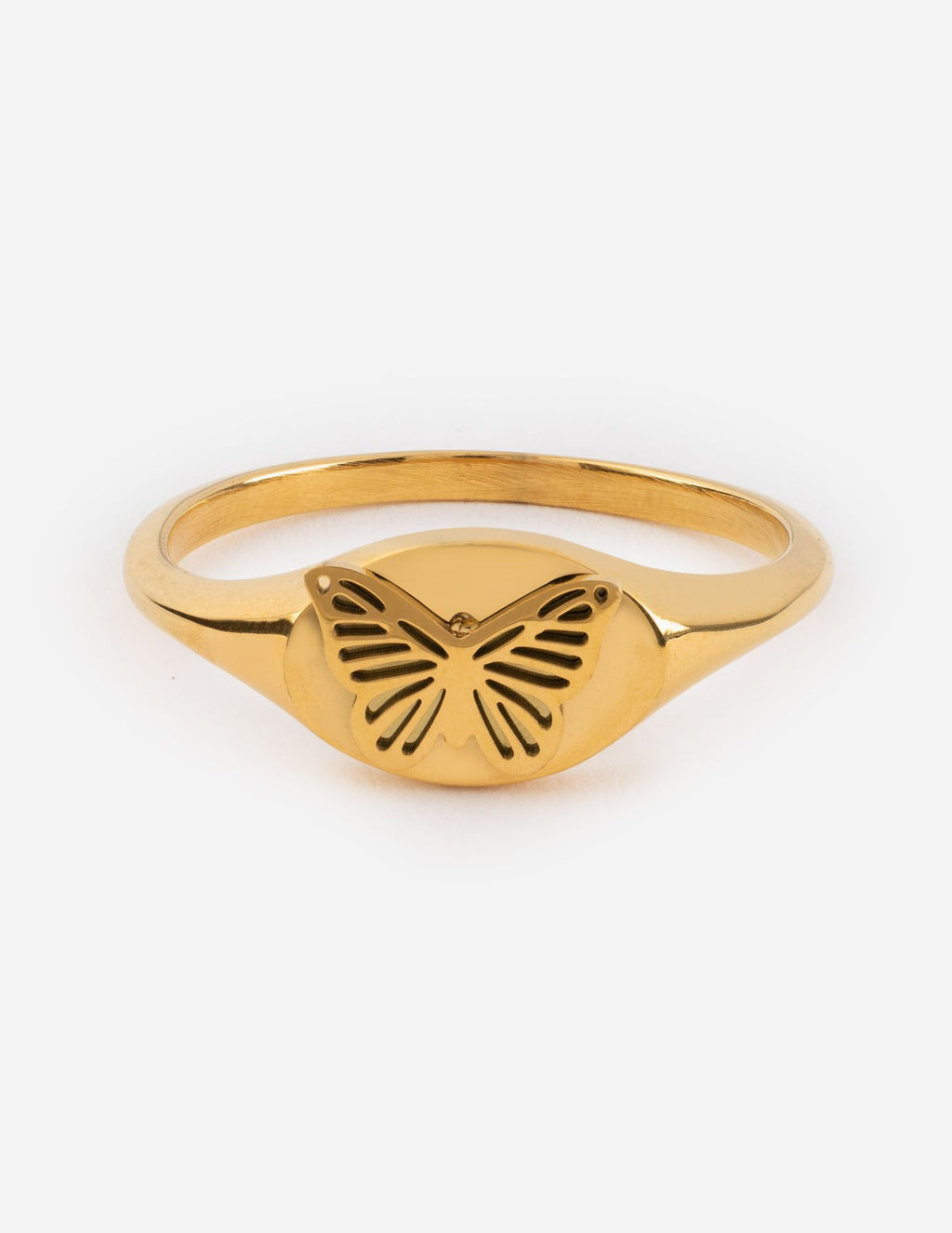 Gold butterfly signet ring with cutout wings on oval face