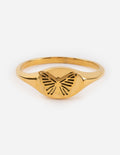 Gold butterfly signet ring with cutout wings on oval face