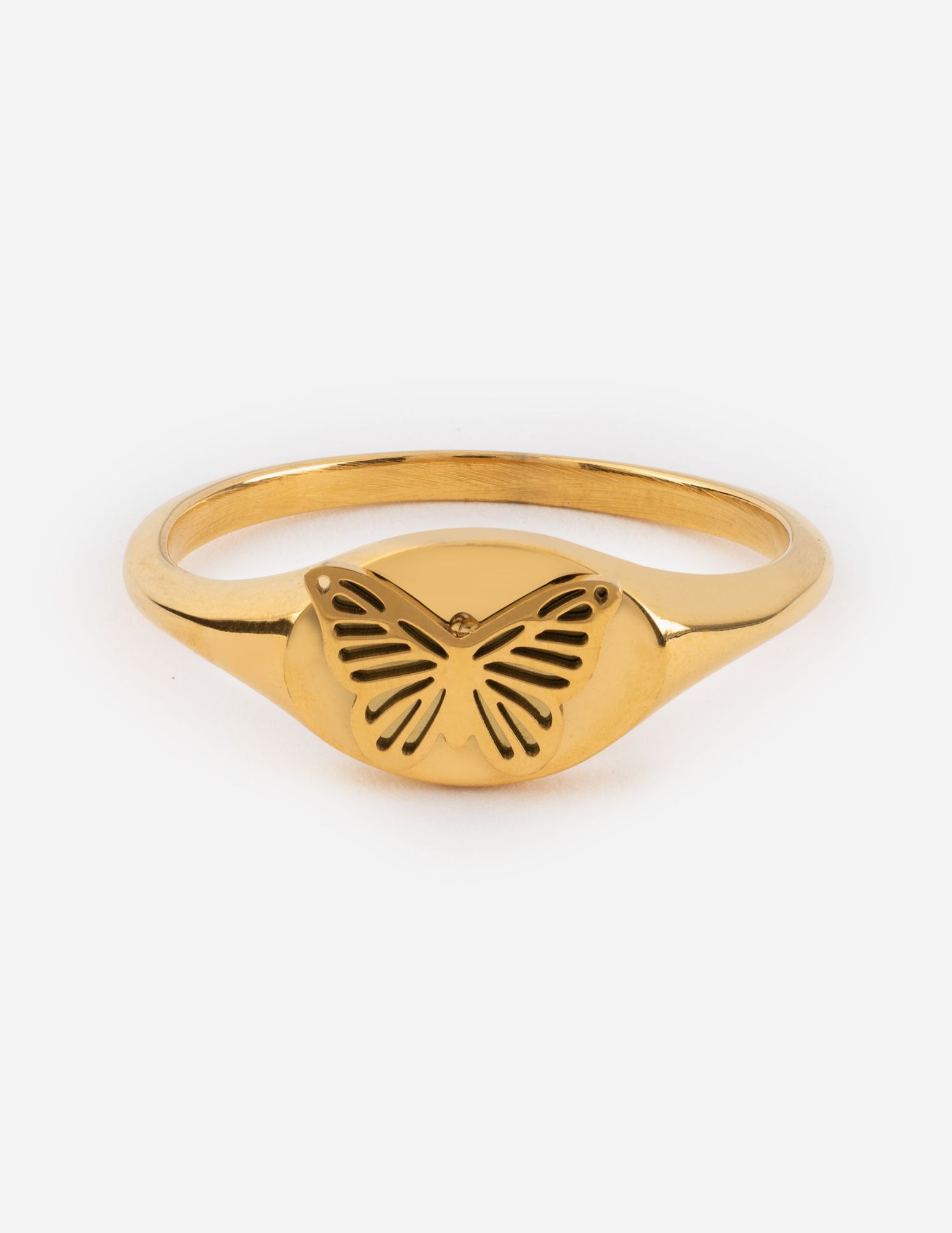 Gold butterfly signet ring with cutout wings on oval face