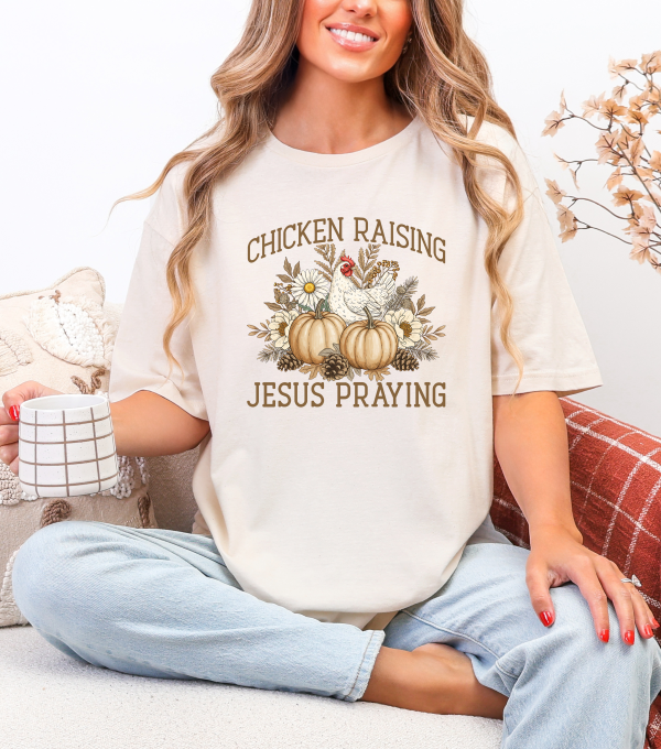 Cream crewneck T-shirt with Chicken Raising Jesus Praying print, chicken and floral pumpkin