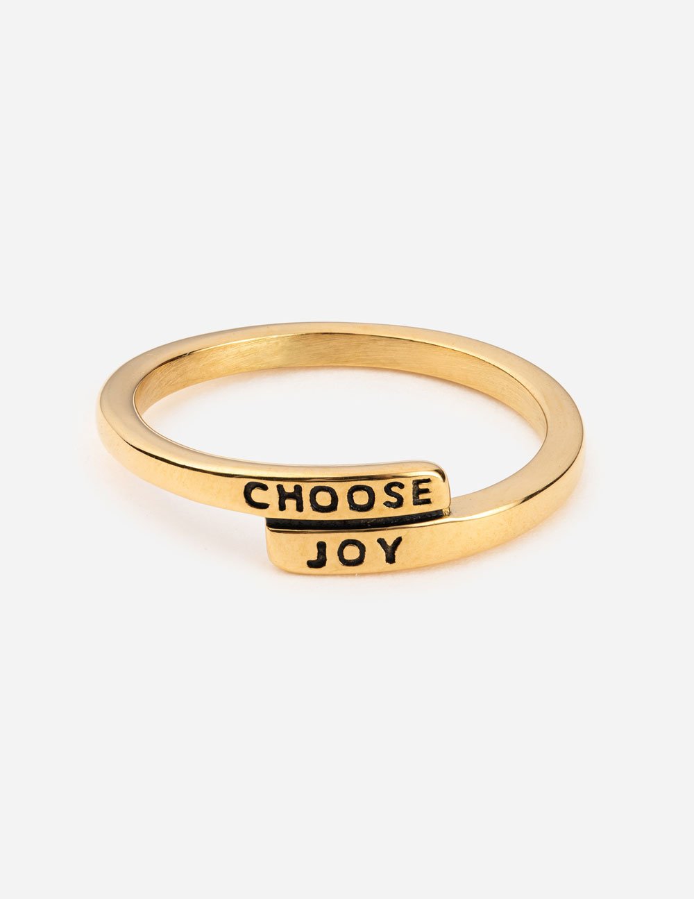 Gold ring with black enamel text reading 'CHOOSE JOY' on the band