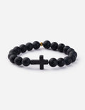Black beaded cross bracelet with small gold connector and centered cross charm