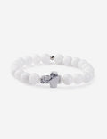 White bead bracelet with cross charm centerpiece