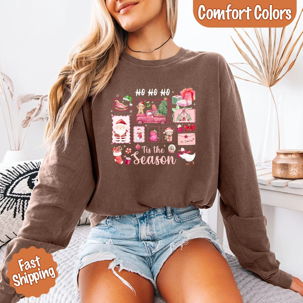 Brown long sleeve Christmas shirt worn with blue denim, featuring "Ho Ho Ho" "Tis the Season" art
