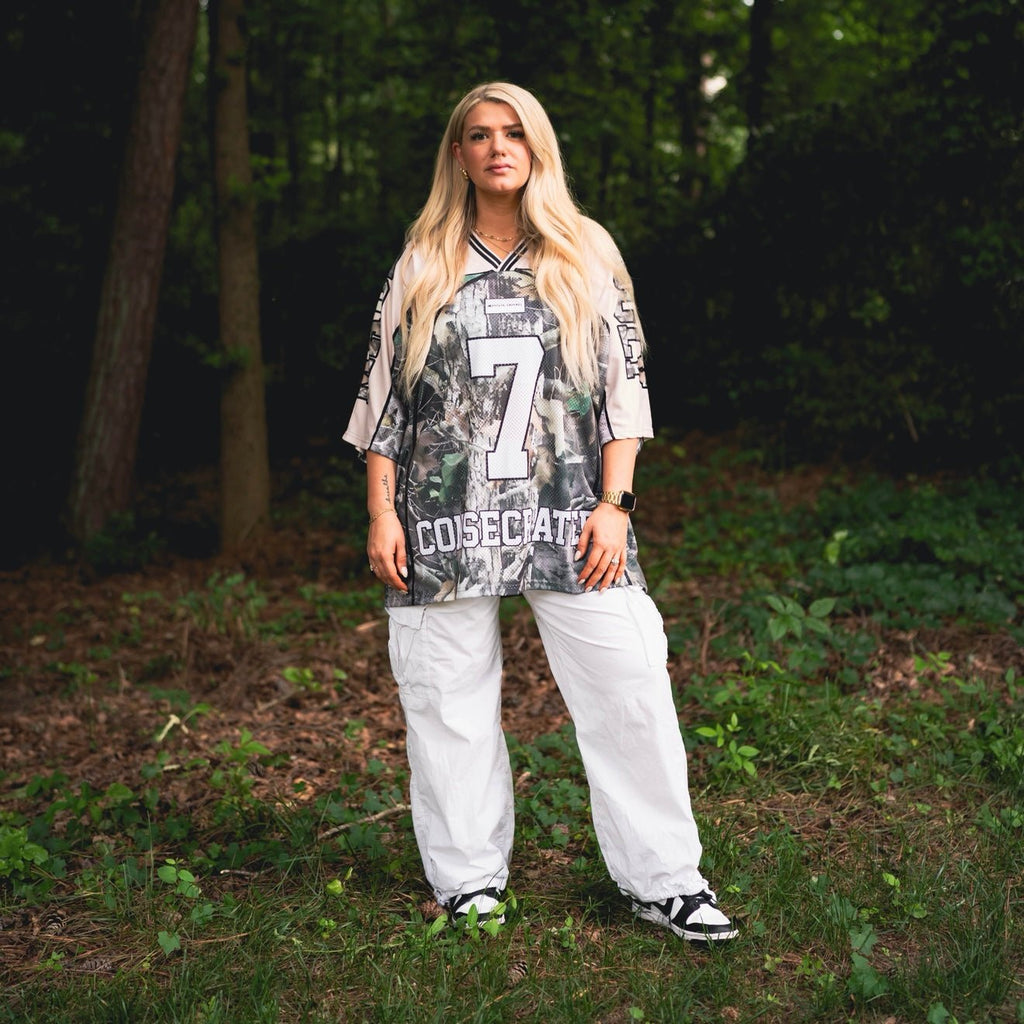 Oversized jersey front view with number 7 graphic and woodland camo side panels