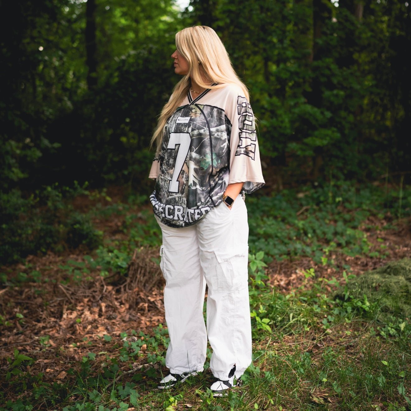 Oversized jersey front view in woodland camo with number 7 and cream sleeves
