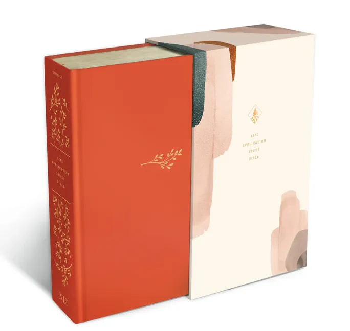 Coral hardcover study Bible with embossed front design and green spine trim