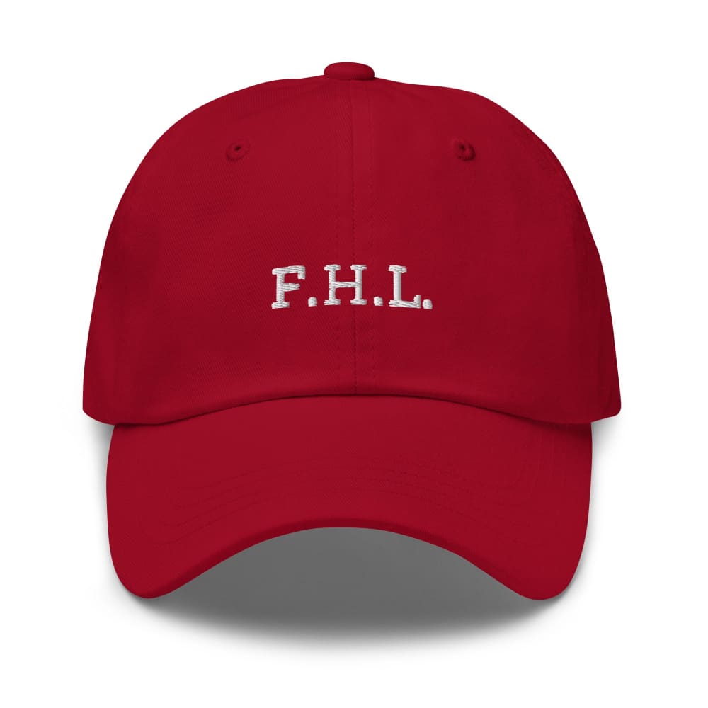 Cranberry red baseball cap with embroidered “F.H.L.” on the front