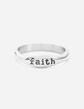 Silver ring band with 'faith' engraved on the front
