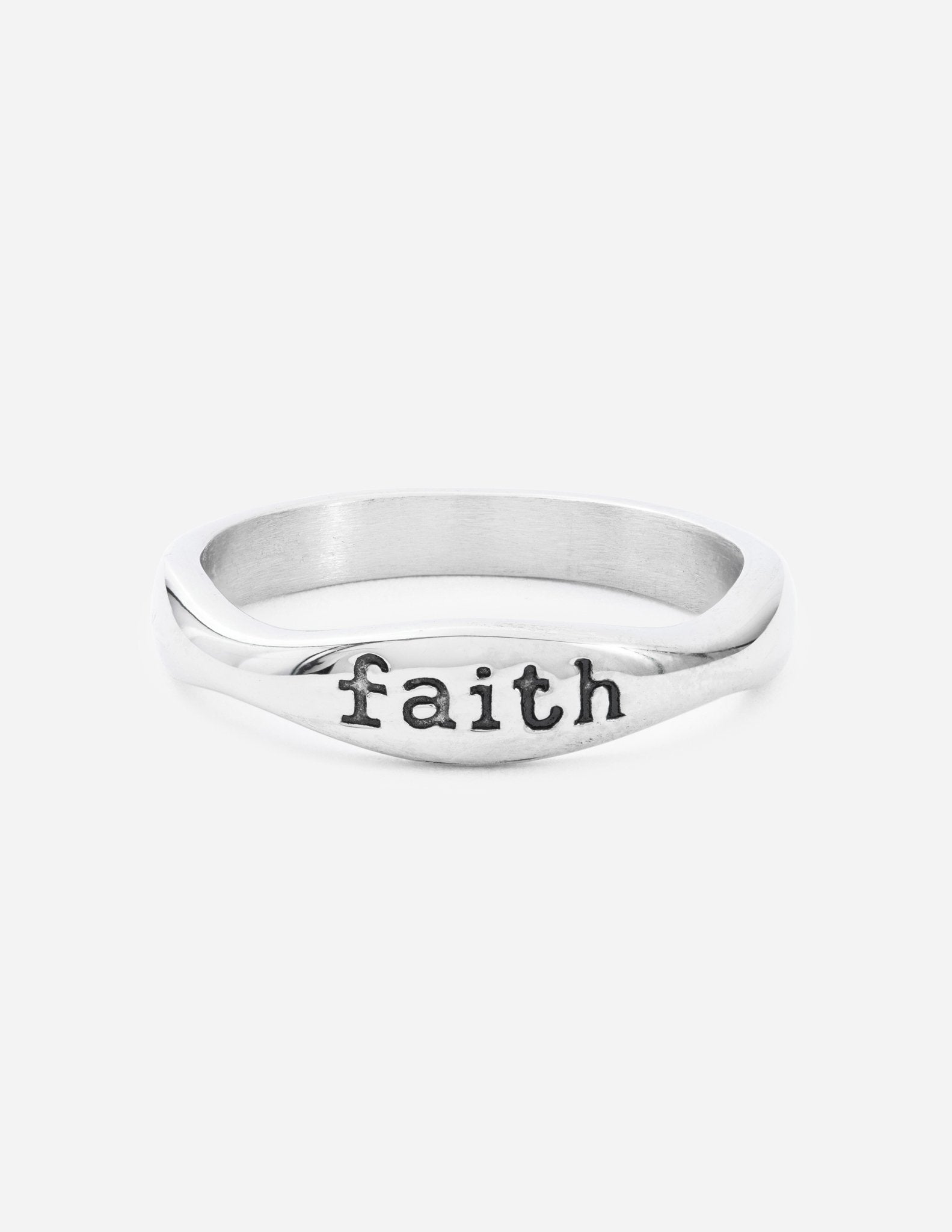 Silver ring band with 'faith' engraved on the front