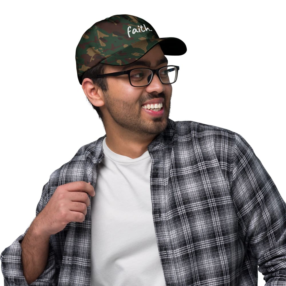 Cotton baseball cap in green camo with white Faith scribble logo