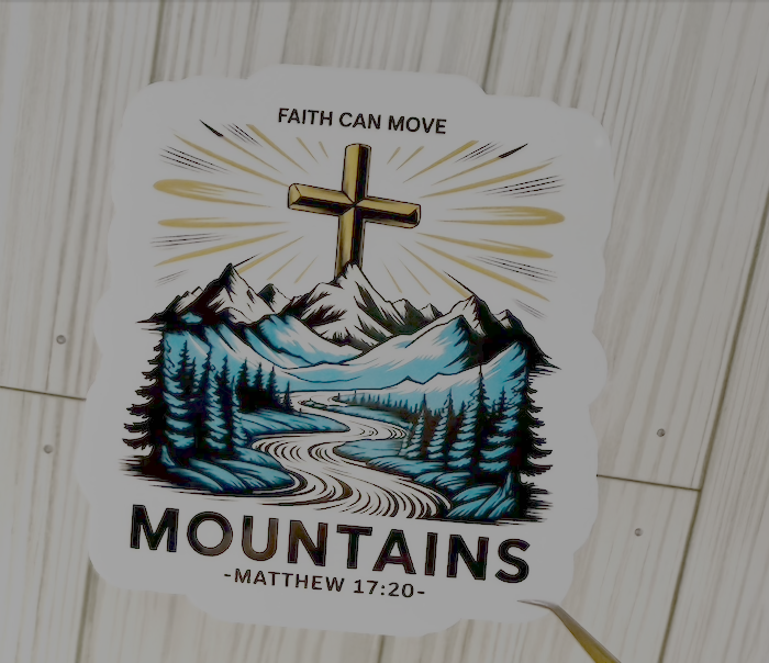Faith Can Move Mountains sticker with cross over blue mountain landscape, Matthew 17:20 text