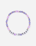 Purple beaded bracelet with stacked letter beads spelling "GOD IS GOOD"