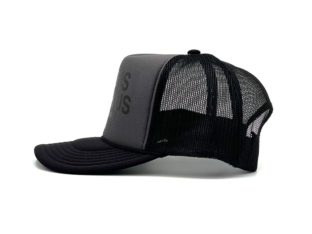 Charcoal foam trucker cap with black mesh sides and curved brim