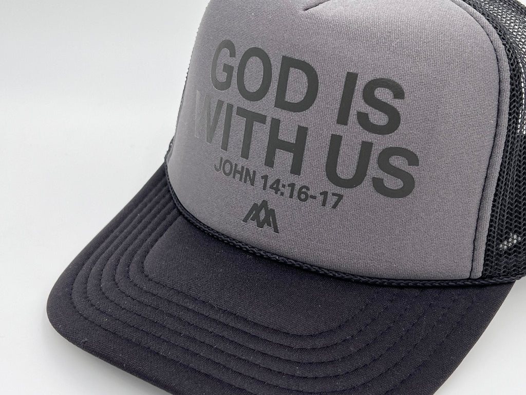 Charcoal foam trucker cap with “GOD IS WITH US” front graphic