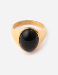 Gold-tone signet ring with dark oval black stone and engraved top text detail