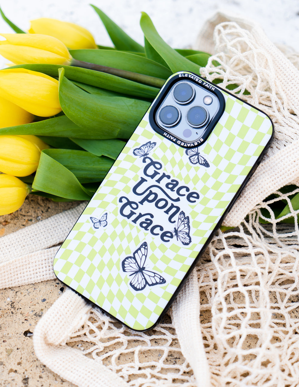 Lime green checkered phone case with butterflies and “Grace Upon Grace” lettering