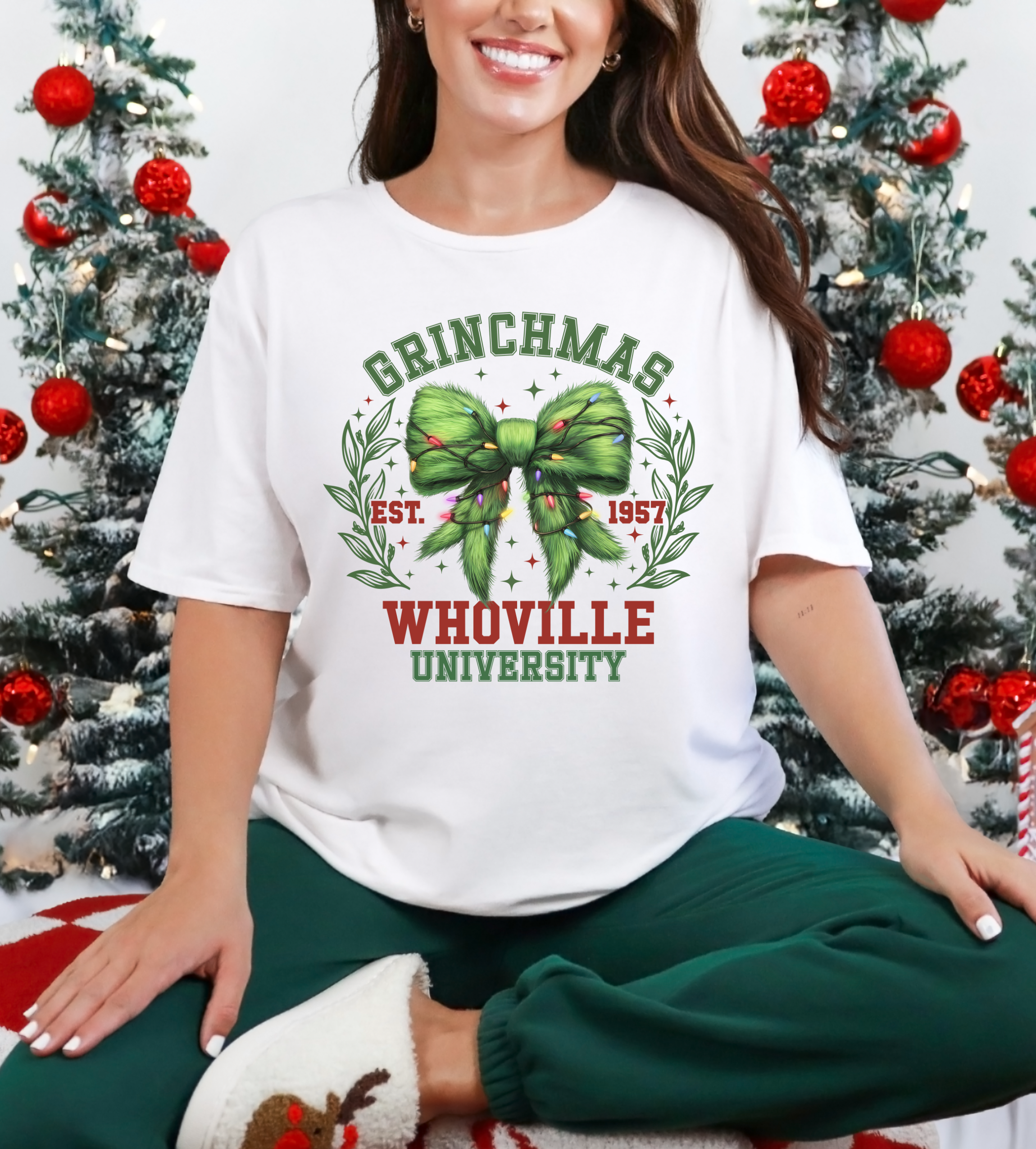 White crewneck T-shirt with green Grinchmas bow and Who-ville University print