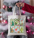 Cream canvas Christmas tote bag with green cartoon character and holiday stickers, top handles