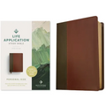 Personal size study bible with brown leatherlike cover and stitched edges
