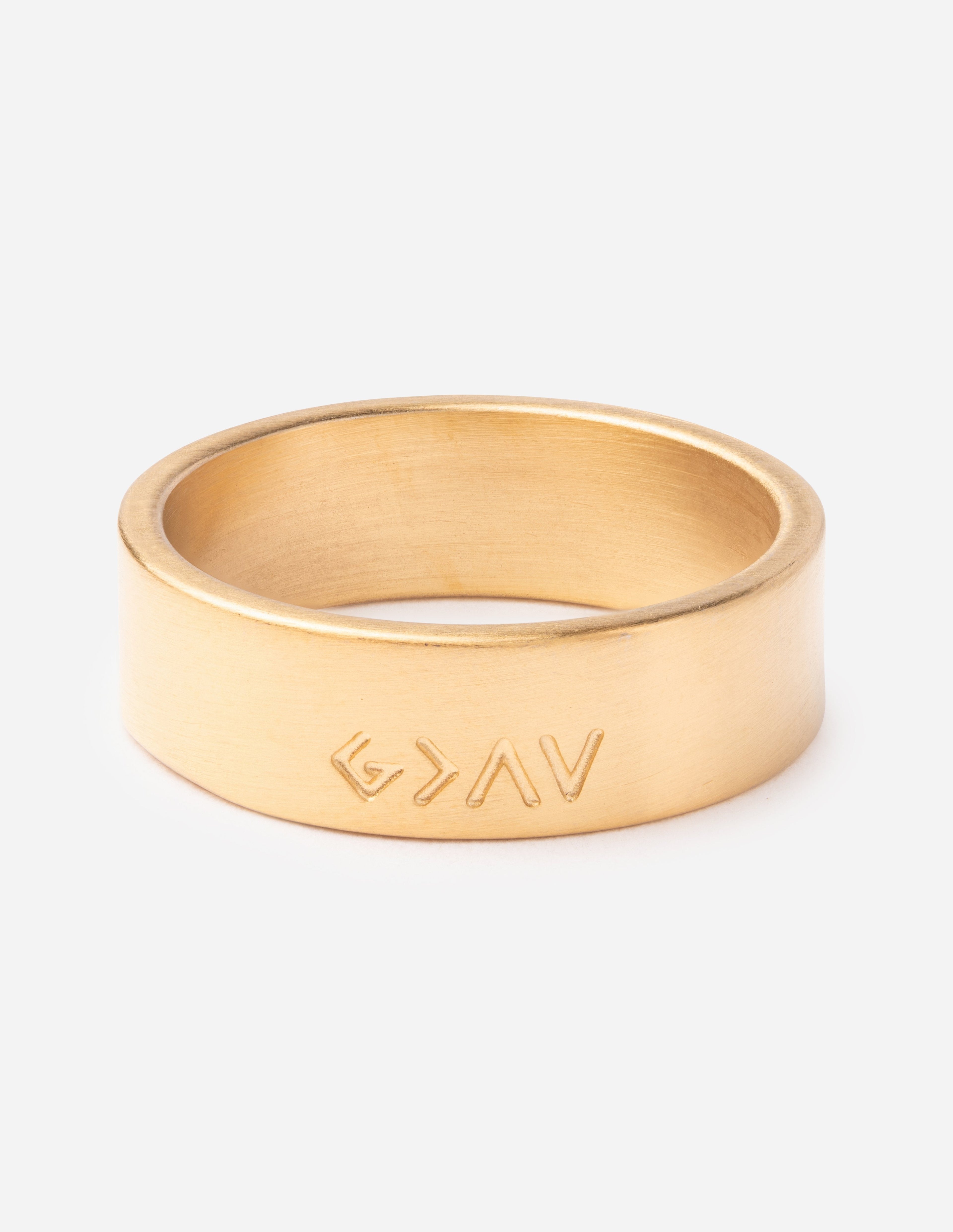 Matte gold ring with engraved letters on wide band