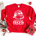 Red crewneck sweatshirt with white Santa Ho's house text
