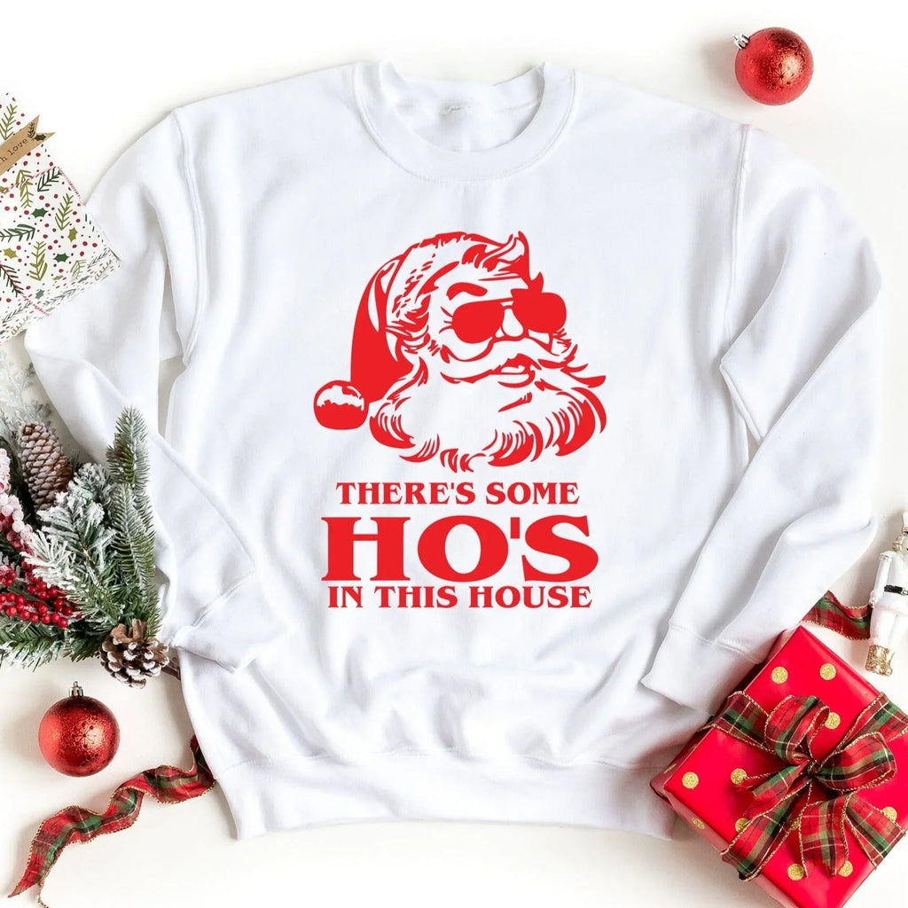 White crewneck sweatshirt with red Santa graphic and 'Ho's in this house' text