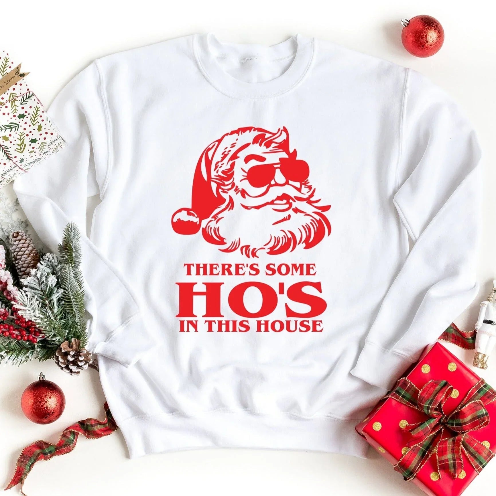 White crewneck sweatshirt with red Santa graphic and 'Ho's in this house' text