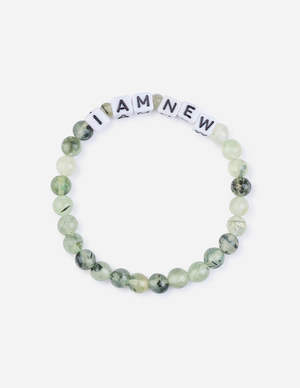 Letter beaded bracelet with spaced white block letters on light green round beads
