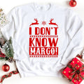 White sweatshirt with red holiday reindeer text graphic 'I DON'T KNOW MARGO!'
