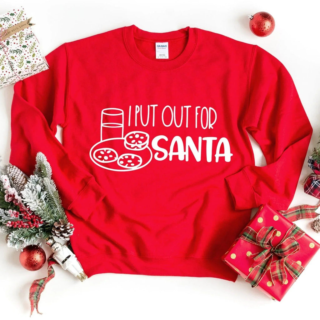 Red sweatshirt with 'I PUT OUT FOR SANTA' graphic on the front