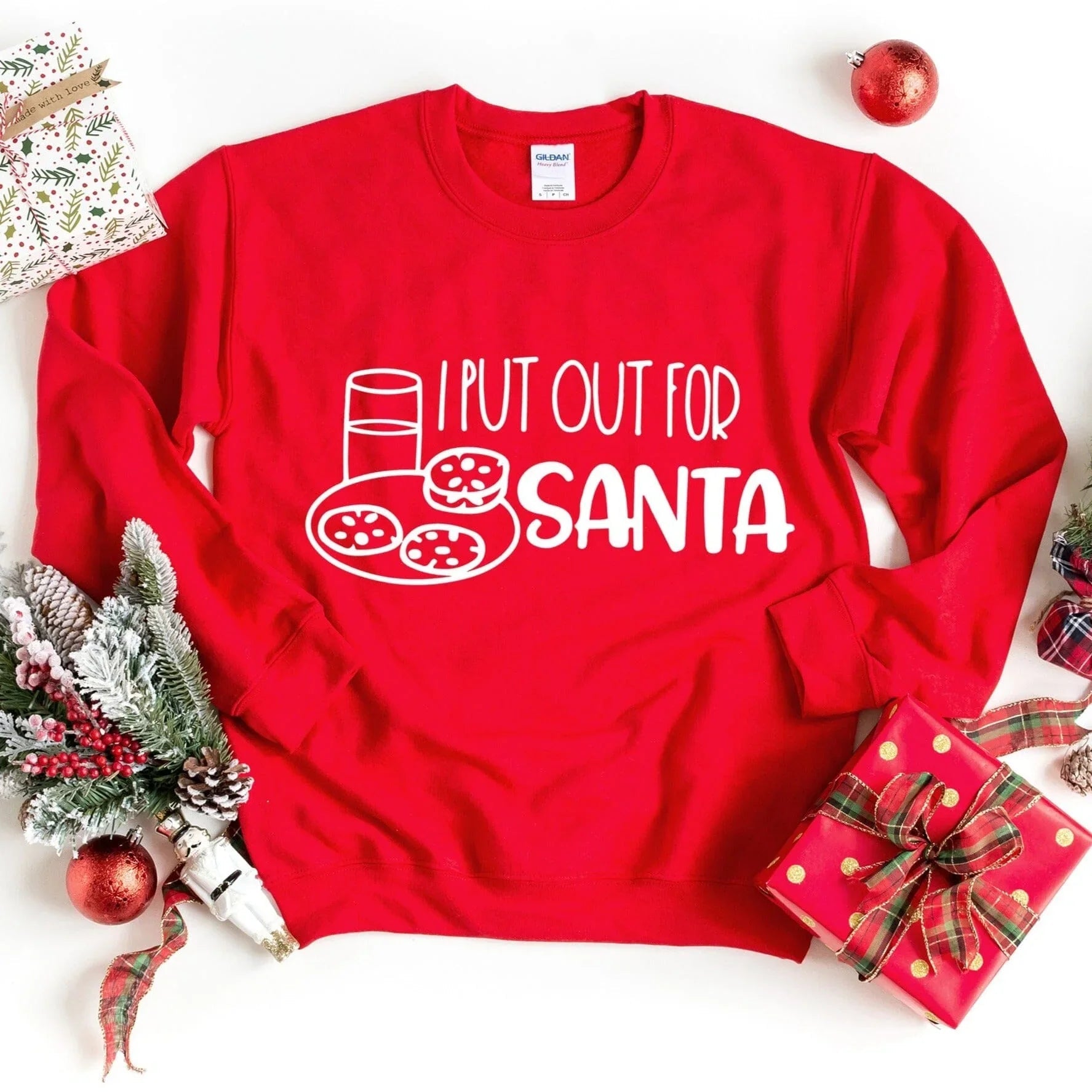 Red sweatshirt with 'I PUT OUT FOR SANTA' graphic on the front