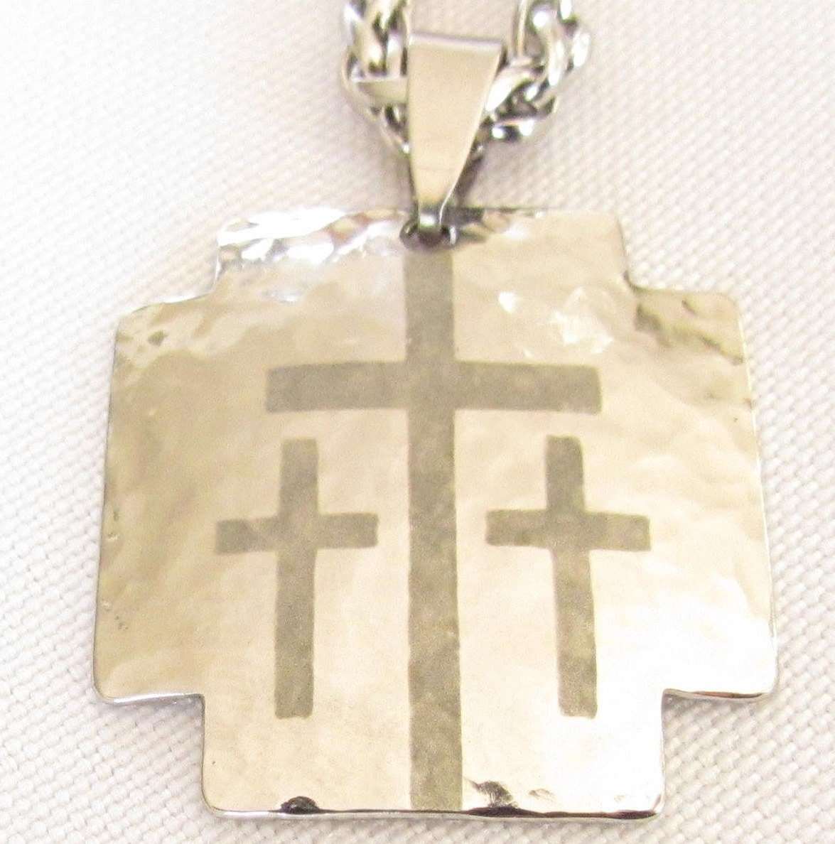 Hammered silver dog tag pendant with triple cross design on chain