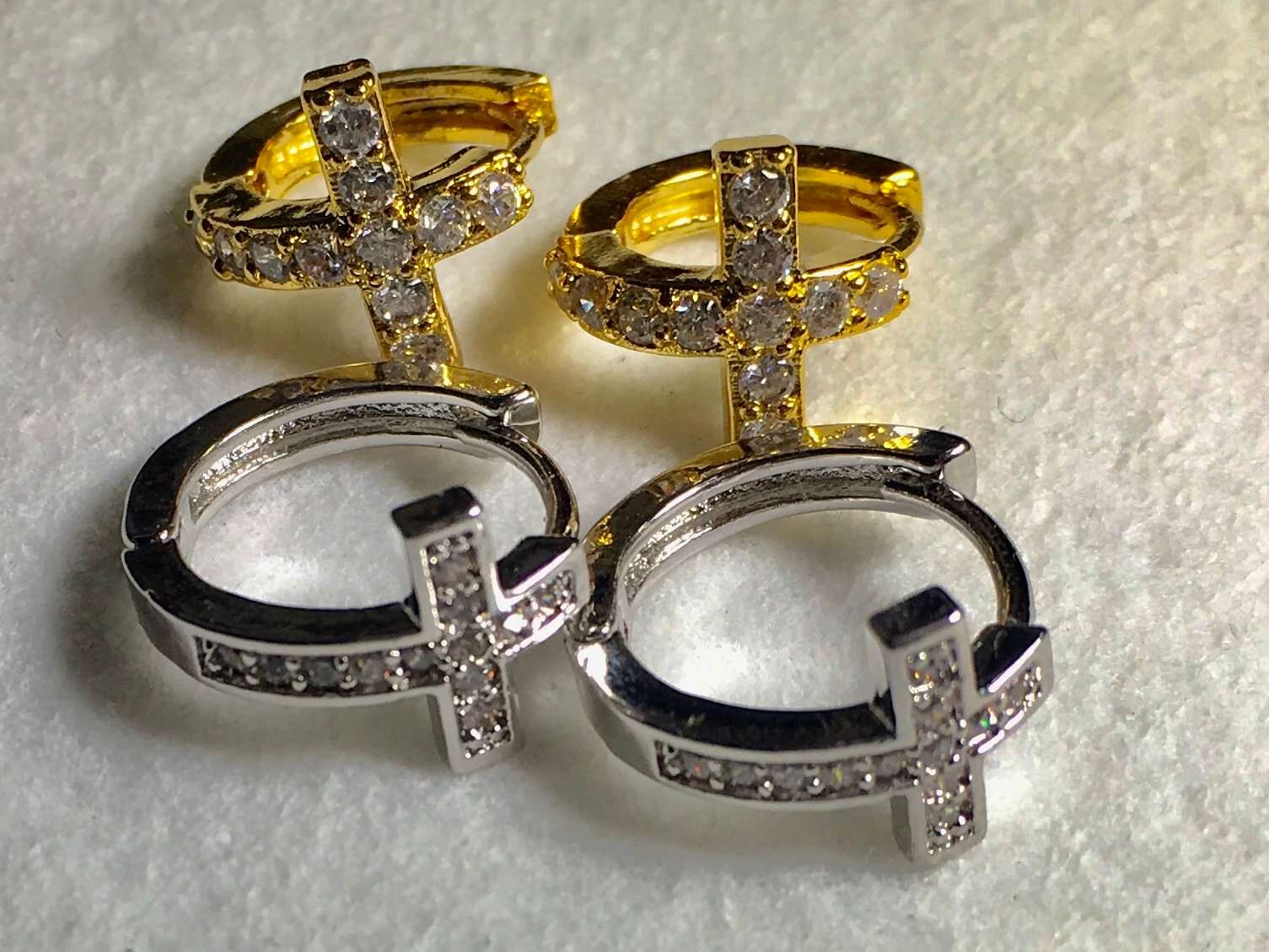 Cross hoop cuff earrings in gold with silver inset cross, hinged CZ-style stones