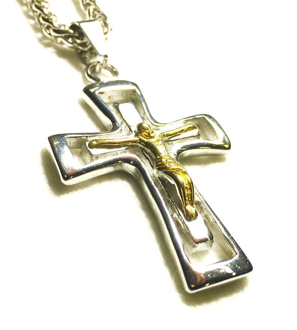 Silver-tone crucifix pendant necklace with gold Jesus figure on chain