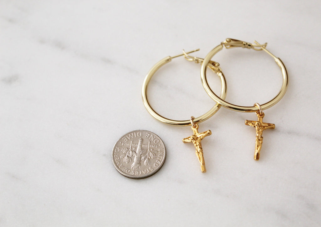 Gold-tone crucifix hoop earrings with cross charms, side-by-side