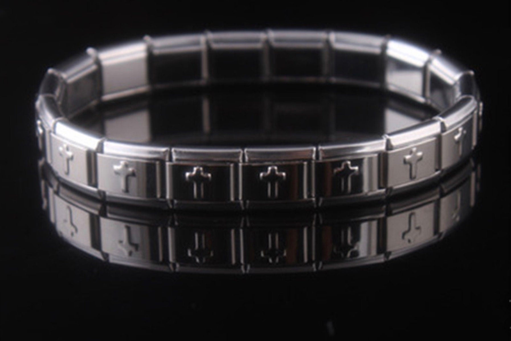 Silver-tone stretch bracelet cuff with cross link bars and dark accents