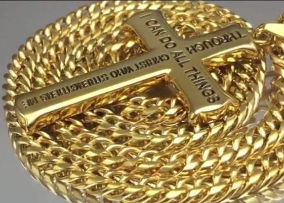 Gold tone cross pendant with engraved 'I can do all things' text and link chain