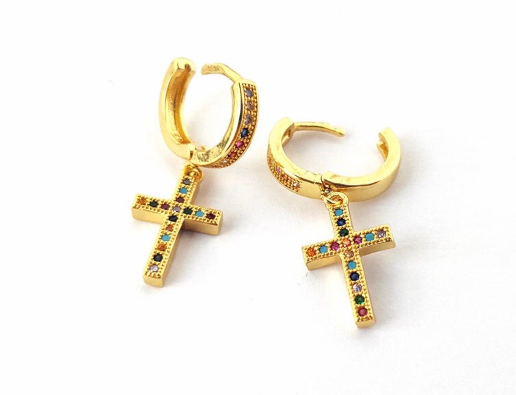 Gold hoop earrings with dangling cross charm, rainbow zircon and enamel detail