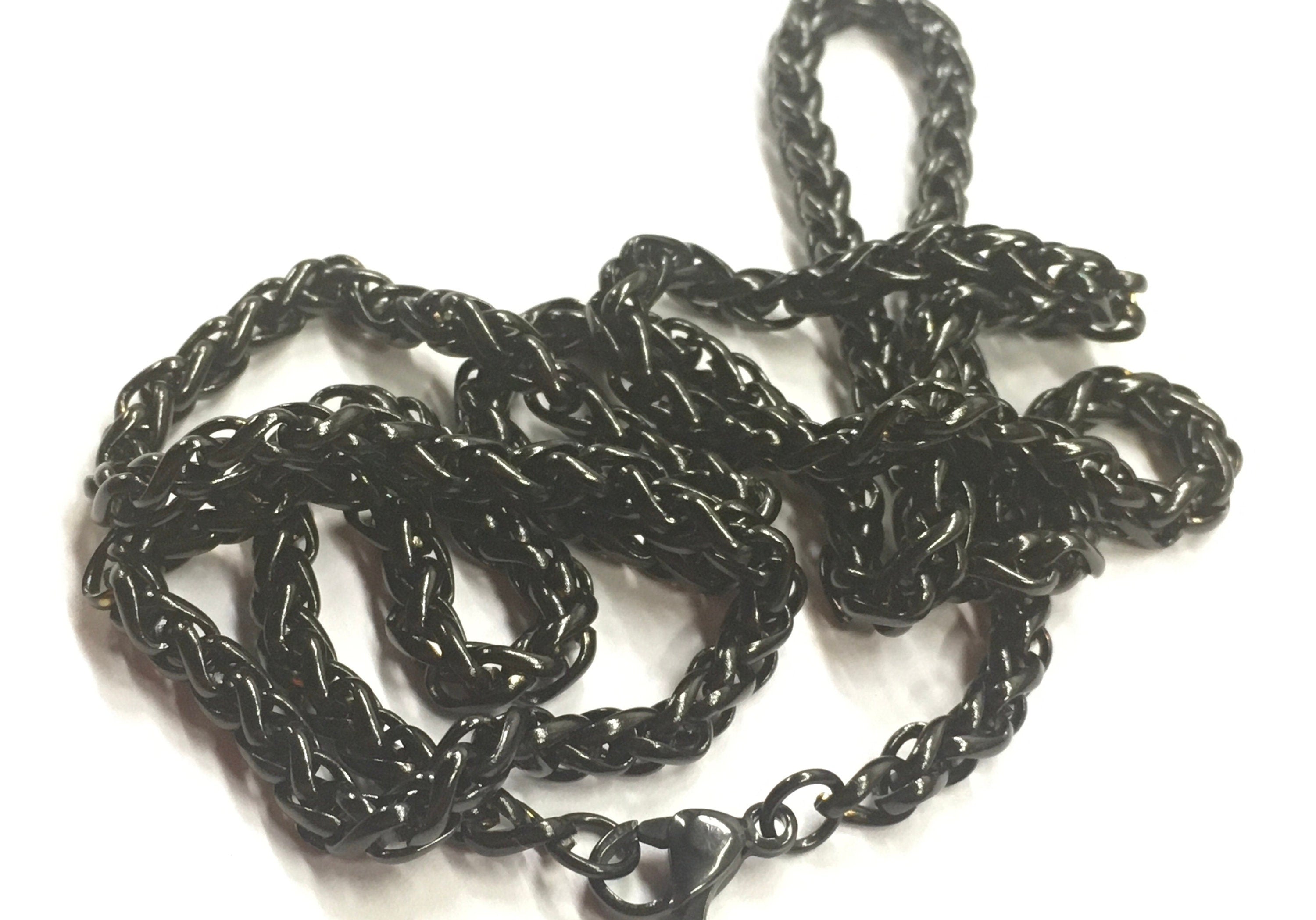 Black cross pendant necklace with chunky twisted chain and cross