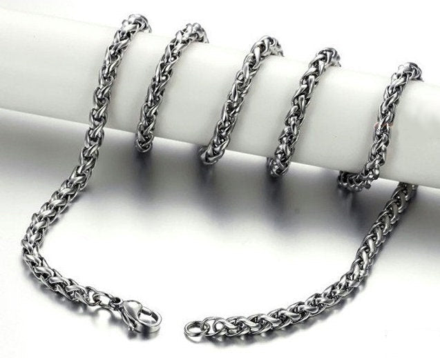 Stainless steel link chain necklace with metal clasp, no pendant visible