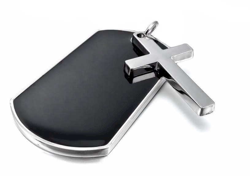 Silver cross pendant necklace on dark dog tag with link chain