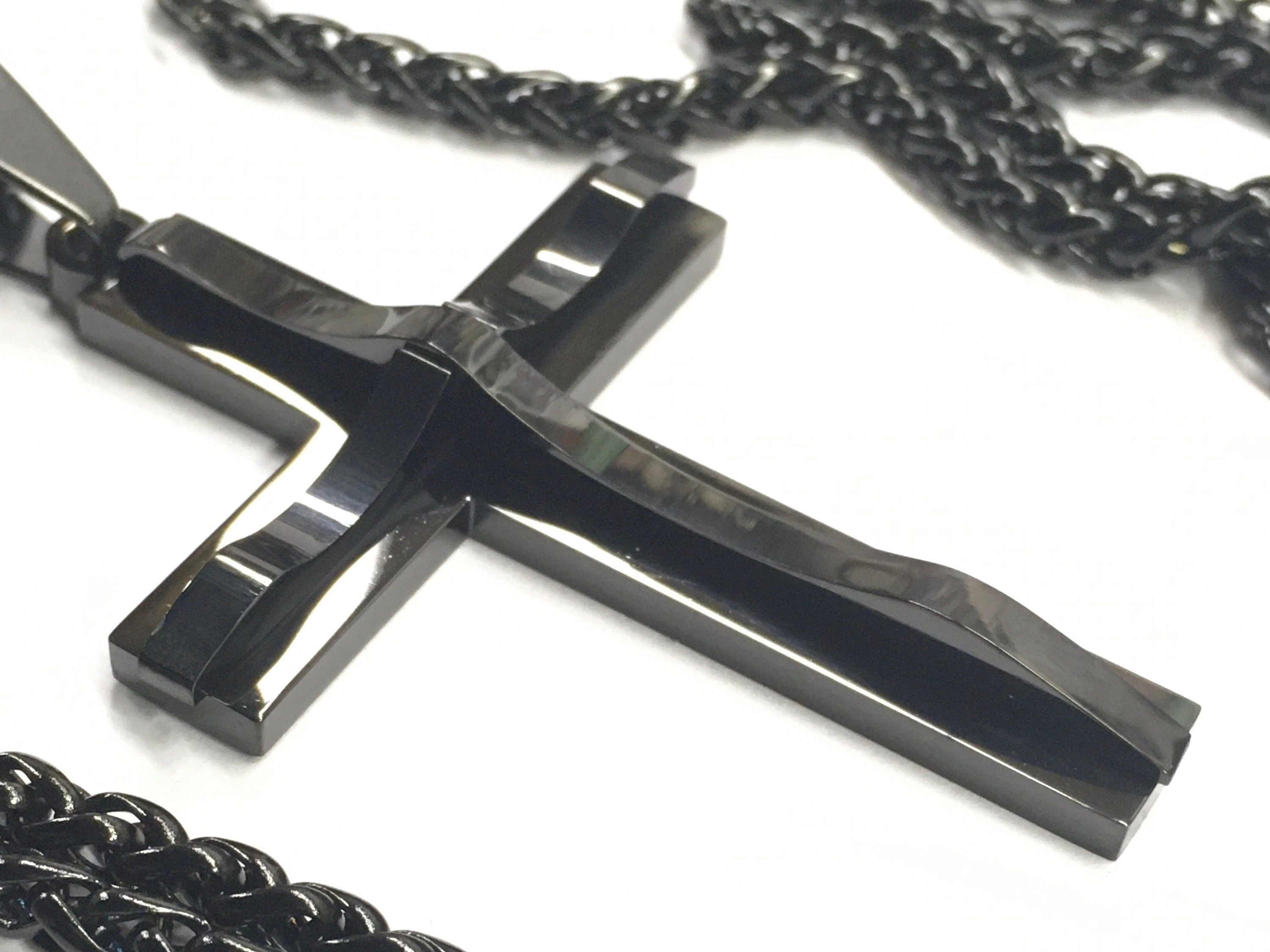 Black cross pendant necklace with thick rectangular links